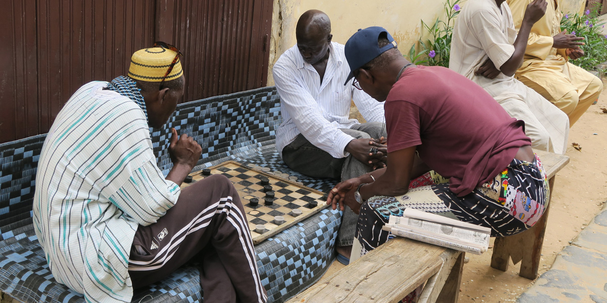 Three men playing a game